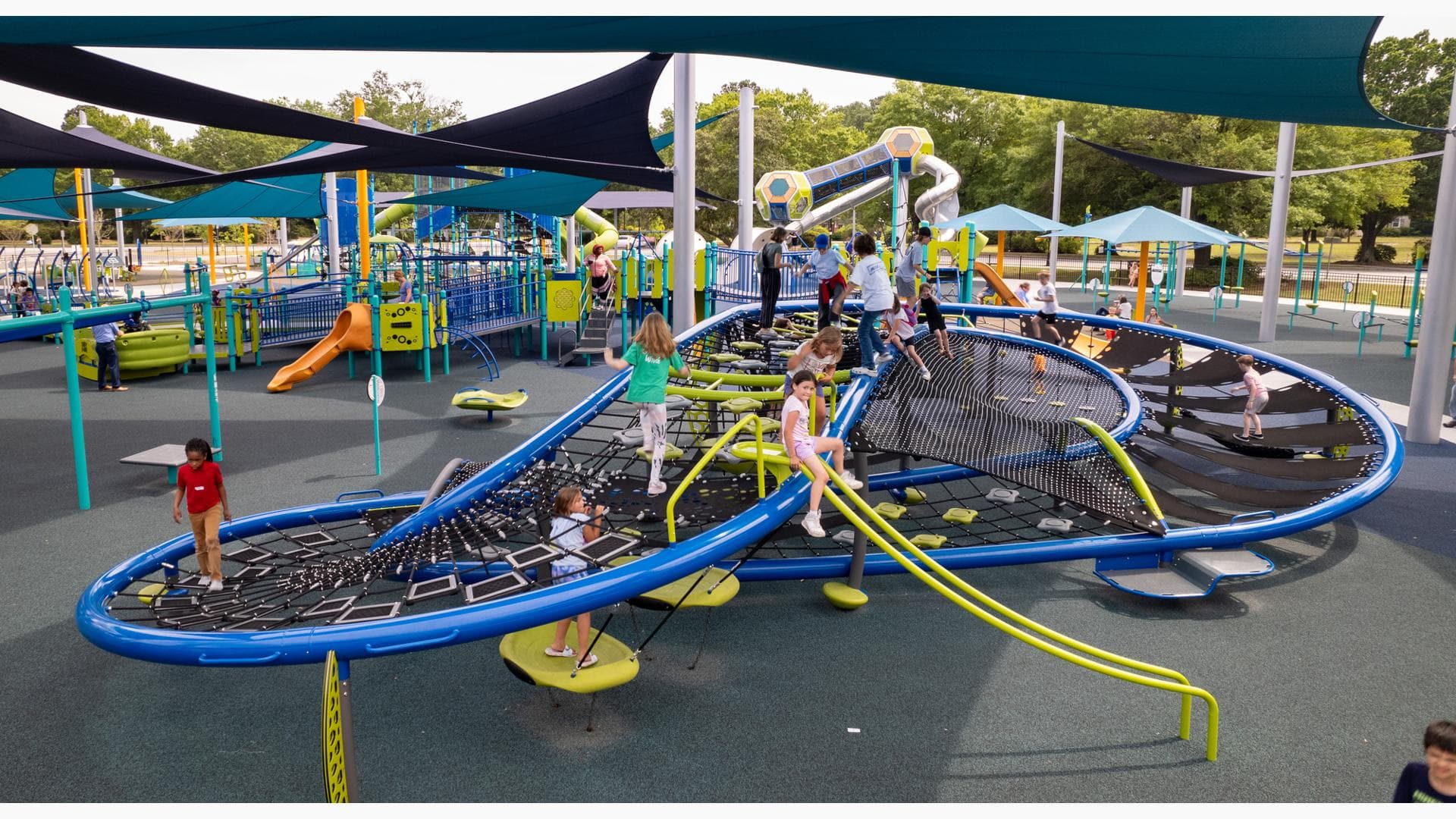 Toddler playing at a Charleston park playground